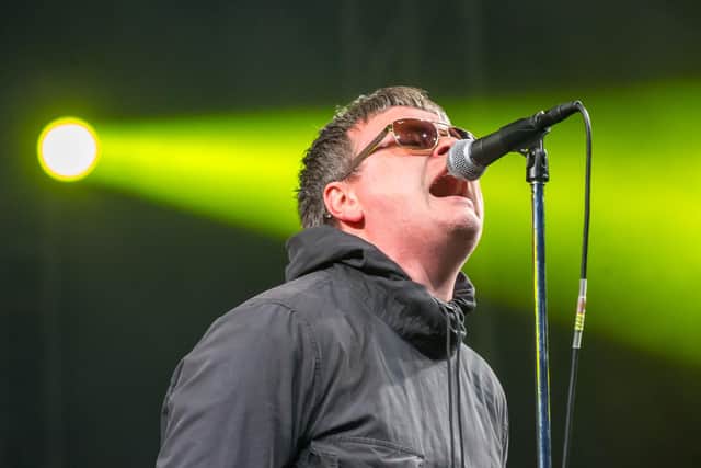 Chris Maddocks does his best Liam Gallagher impression as Oaces take to the stage at Tribfest 2025. Dave Lofthouse