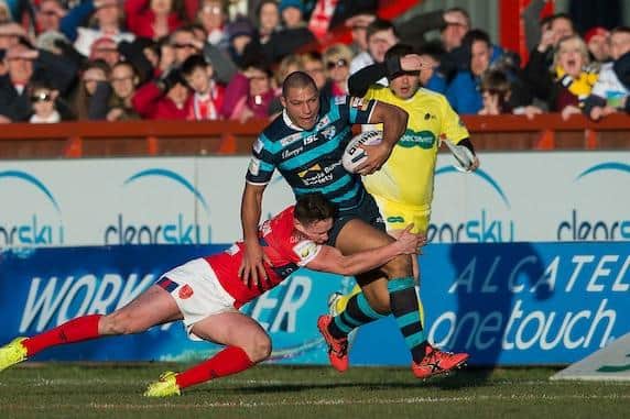 James Donaldson tackles Leeds Rhinos' Ryan Hall at Craven Park in 2015. The pair have since swapped clubs. Picture by Allan McKenzie/SWpix.com.