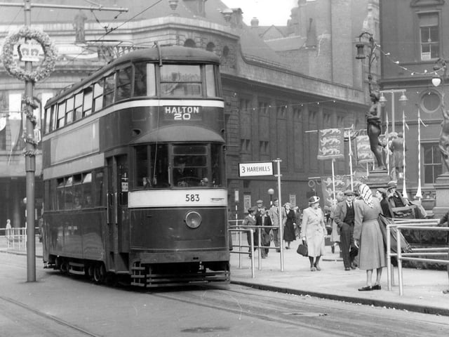 Decorations are still in evidence following the coronation four days earlier. The view shows ex-London tram no.583 stopping in City Square on its way to Halton via route 20. In the background on the left is the Majestic Cinema, then the junction with Quebec Street, and the General Post Office on the right.