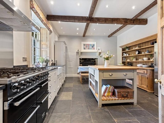 The kitchen also includes an intergrated dishwasher, cast iron log burner, underfloor heating and plenty of room for a large dining table.