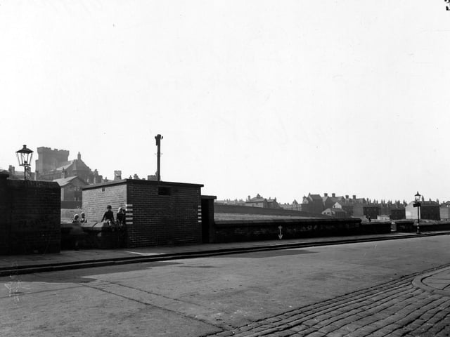 Oak Road with air raid wardens post on west side of road. End of Stapletons Row visible in the foreground on the right. Armley Jail and Gloucester Crescent visible in background. Pictured in September 1945.