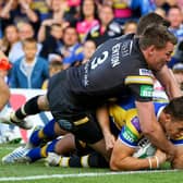 Thomas Minns scores a try on his Leeds Rhinos debut against Castleford Tigers in June, 2013. Picture by Alex Whitehead/SWpix.com.