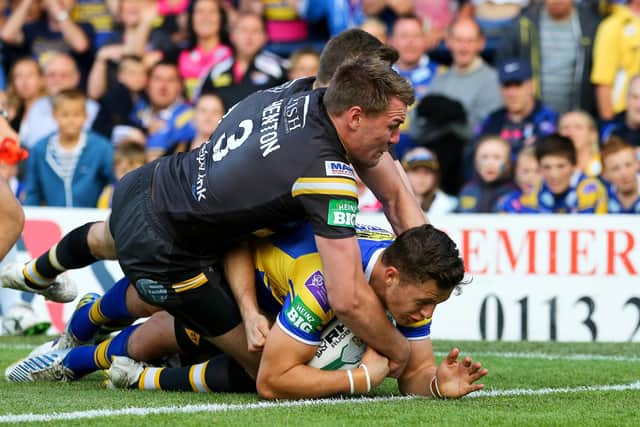 Thomas Minns scores a try on his Leeds Rhinos debut against Castleford Tigers in June, 2013. Picture by Alex Whitehead/SWpix.com.