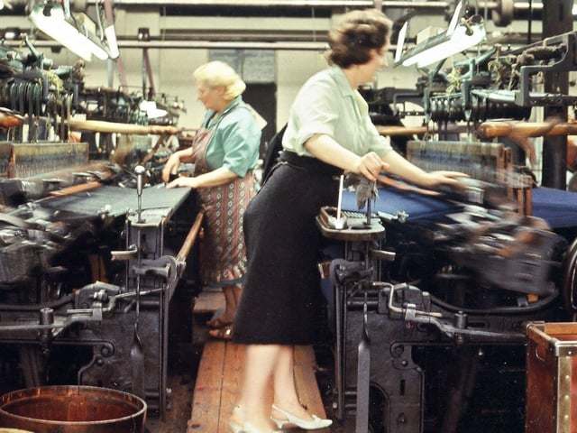 Plain looms, made by Lee and Crabtree, being used by female workers to weave ladies' overcoating material at J. & S. Rhodes' Prospect Mills. Normally looms are on the ground floor in textile mills due to the weight of the machinery or may be housed in a special weaving shed. Pictured in June 1965.
