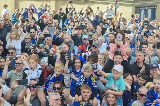 Fans turned out to welcome the players.