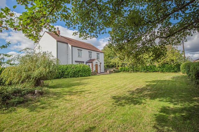 The property's plot extends to 4.5 acres, with lovely gardens and extensive grazing land.
