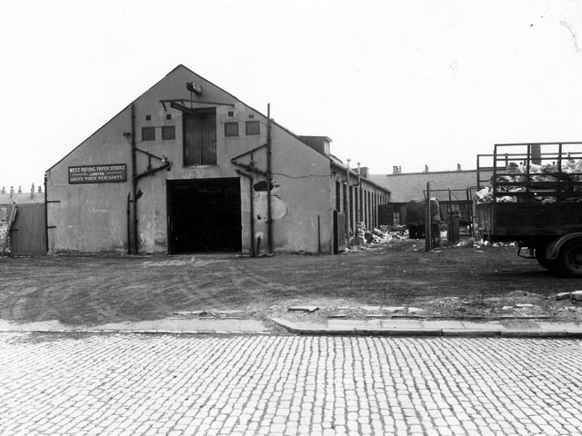 Wellington Mills on Mill Green pictured in March 1965. This was the premises of West Riding Paper Services Ltd, waste paper merchants. A lorry loaded with paper and card is just visible on the right edge.
