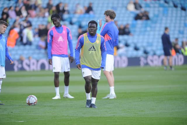 Leeds United forward Willy Gnonto warms up before his Under-21 debut for the club