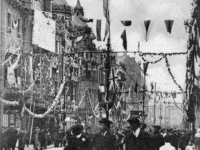 Briggate elaborately decorated for the Royal visit.