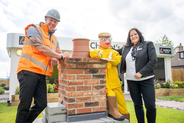 SGB-35469 Harron Homes Site Manager Michael Heels with Sales Executive Allison Melia