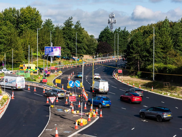 Current works include planning the existing carriageway, ironworks, laying binder, tarmac surfacing and associated white lining.