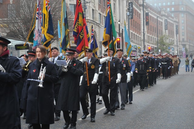 The parade marching through Leeds to the service.