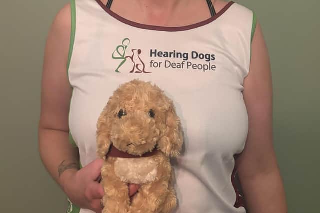 Charlotte from Otley, who is running the London Marathon for national charity Hearing Dogs for Deaf People.