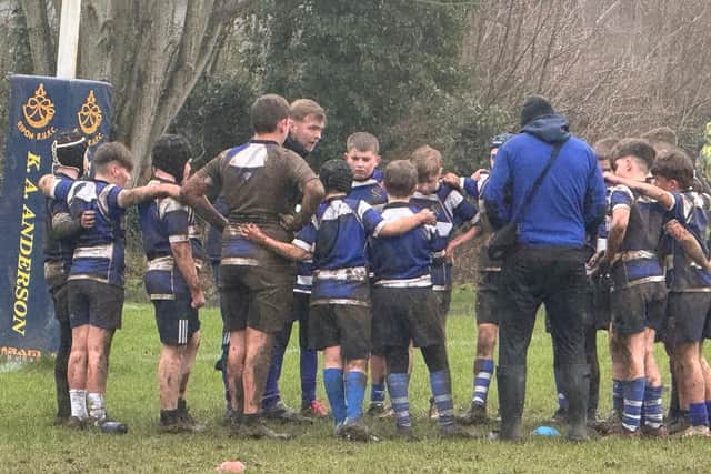 HALF TIME ENCOURAGEMENT FROM COACH ALEX AND CHARLIE.