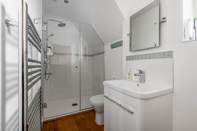 A large walk-in shower is a feature of this bathroom.