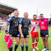 Hull KR's Rhyse Martin, third from left, with former Leeds Rhinos teammates Mikolaj Oledzki, Cameron Smith, Sam Lisone, Jarrod O'Connor and Tom Holroyd following lastmonth's game between the sides at Sewell Group Craven Park. Picture by Allan McKenzie/SWpix.com.
