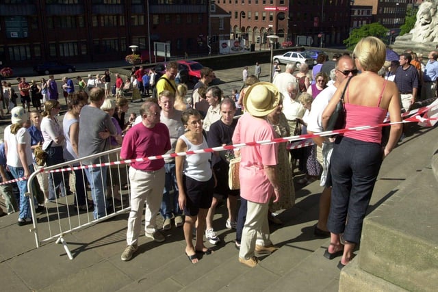 People queue to snap up free Classical Fantasia tickets.