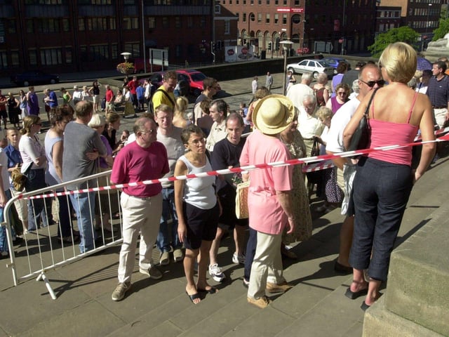 People queue to snap up free Classical Fantasia tickets.