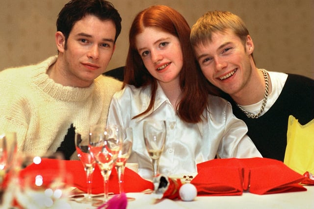 This is Hayley Wood from Richmond Hill pictured with her two favourite members of pop band Boyzone, Stephen Gateley (left) and Ronan Keating. She won a Noel Edmunds Xmas present in December 1995 to meet the band after being nominated by her dad Brian.