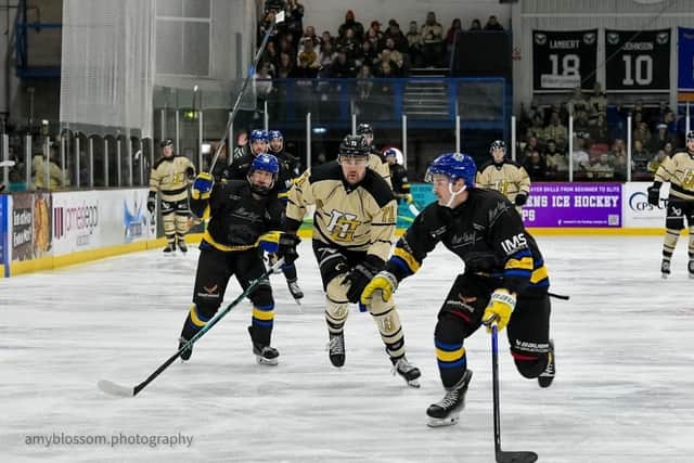 DERBY DELIGHT: Leeds Knights' Sam Dunn (right) - who scored his team's first goal right - is put under pressure by Hull Seahawks' Emil Svec. Picture: Amy Blossom/Seahawks Media