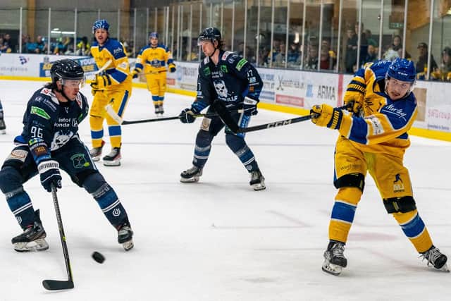 TAKE THAT: Former Leeds Knights' 'D' Ben Solder (left) is powerless to prevent Kieran Brown (right) from making it 7-1 at Elland Road on Sunday night. Picture courtesy of Oliver Portamento