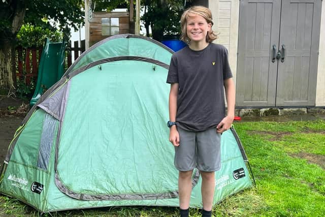 Billy, 13, has been sleeping in a tent for over a year to raise money for Emmaus Leeds.