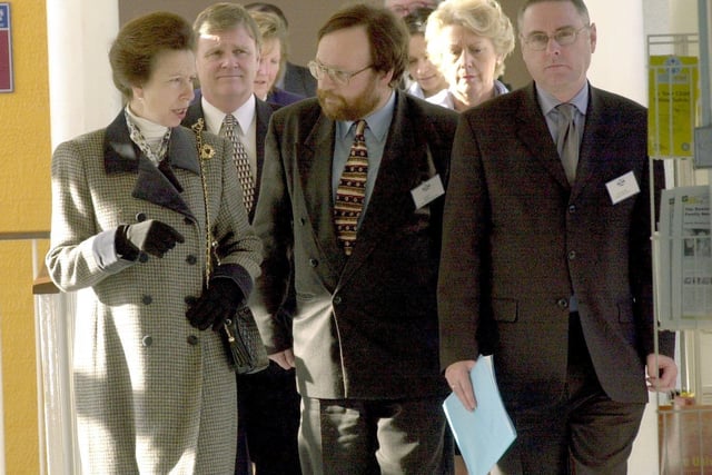 HRH Princess Royal walks along with Chris Peat manager of East Leeds Family Learning Centre in Seacroft, Leeds, centre, and Alan Wells, director of the Basic Skills, during her visit on February 14, 2001.