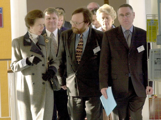 HRH Princess Royal walks along with Chris Peat manager of East Leeds Family Learning Centre in Seacroft, Leeds, centre, and Alan Wells, director of the Basic Skills, during her visit on February 14, 2001.