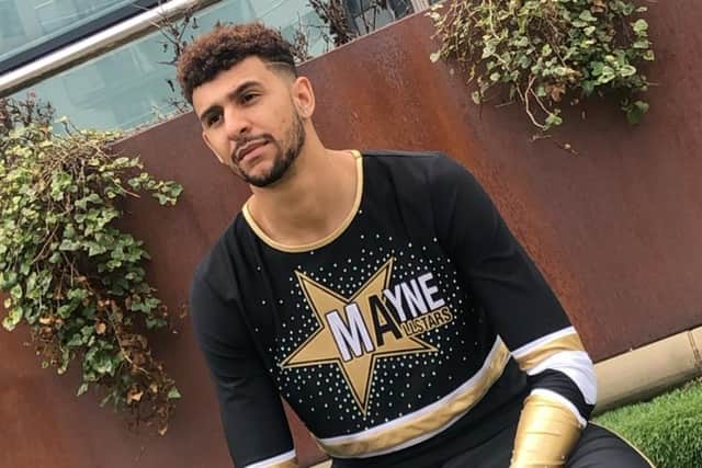 Theo Mayne set up his own cheerleading team in Leeds called Mayne Allstars in 2018