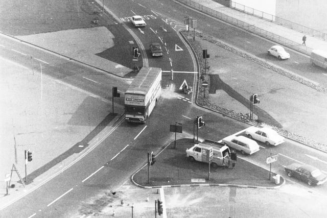 Motorists were getting used to newly instaled traffic lights on Claypit Lane in March 1976.