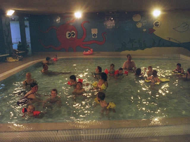 Parents and youngsters enjoy a learning to swim session at Holt Park Leisure Centre in June 1999.