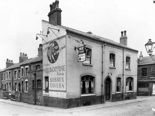 An undated view of the Sussex Tavern on North Hall Terrace, serving Melbourne beers. To the left is Newton Street, Pembroke Street to the right.