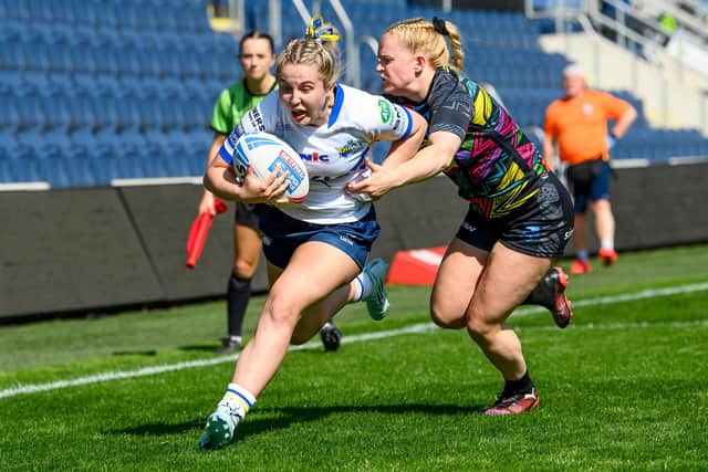 Liv Whitehead scores for Leds Rhinos in their Challenge Cup quarter-final win against Cardiff Demons at AMT Headingley. Picture by Allan McKenzie/SWpix.com.