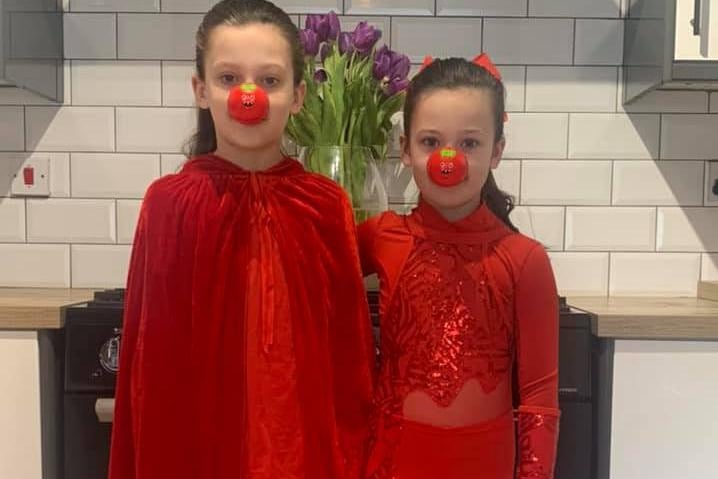 Kay Mitchell shared this photo of Olivia and Evie dressed in red.