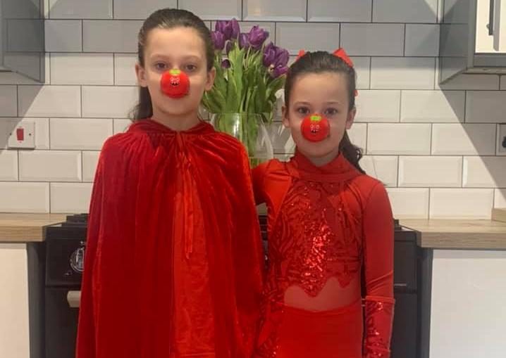 Kay Mitchell shared this photo of Olivia and Evie dressed in red.