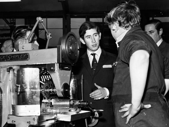 David Gainer, hands on hips, with the Prince of Wales at the British Railways Apprentice's Training School at York in December 1970.
