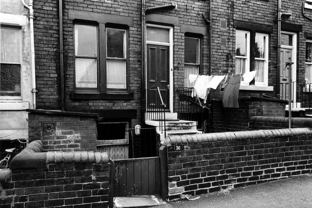 The rear of terraced houses on Stratford Street, which back on to Clovelly Terrace. Pictured in July 1975.