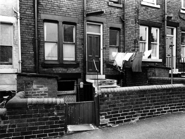The rear of terraced houses on Stratford Street, which back on to Clovelly Terrace. Pictured in July 1975.