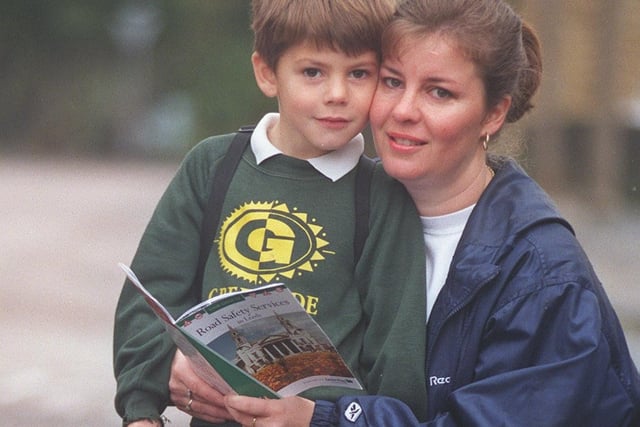 November 1999 and parents and teachers were handed road safety leaflets at Greenside Primary School. Pictured is Susan Barker giving her son Bradley a lesson in road safety.