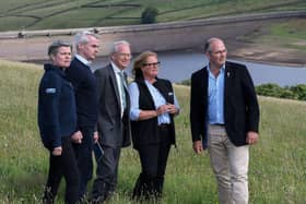 Nicola Shaw from Yorkshire Water, David Henderson, WaterUK CEO, Alan Lovell the Environment Agency Chief, Rachel Hallos, NFU Vice President. Tom Bradshaw NFU President with Baitings Reservoir in the background at the NFU Water Summit, 'Delivering clean water for food security' on NFU Vice President Rachel Hallos farm in Ripponden