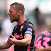 BRISTOL, ENGLAND - AUGUST 04: Liam Cooper of Leeds United celebrates Jack Harrison of Leeds United's goal during the Sky Bet Championship opener between Bristol City and Leeds United at Ashton Gate on August 04, 2019 in Bristol, England. (Photo by Alex Davidson/Getty Images)