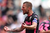 BRISTOL, ENGLAND - AUGUST 04: Liam Cooper of Leeds United celebrates Jack Harrison of Leeds United's goal during the Sky Bet Championship opener between Bristol City and Leeds United at Ashton Gate on August 04, 2019 in Bristol, England. (Photo by Alex Davidson/Getty Images)