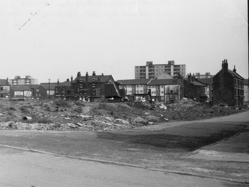 St. Mary's Lane, at the junction with Rider Street in May 1960. At the right edge part of the Parochial Hall can be seen, belonging to St. Patrick's Roman Catholic Church. Land is in the process of being cleared and was to become the site of Agnes Stewart C. of E. High School. In the background flats in Rigton Approach are visible.