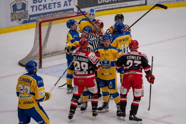 FLASHPOINT: In what was an overall niggly game, the officials try to calm things down between Leeds Knights and Swindon Wildcats players on Sunday night. Picture courtesy of Oliver Portamento