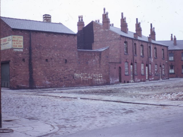 This view seen from Cambrian Street in May 1973 shows Geranium Terrace with Geranium Street to the left and Bowness Street to the right. Stott Brothers Glass Manufacturers is on the left