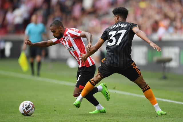 OPPORTUNITY: For Leeds United's Cody Drameh, right, pictured in combat with Rico Henry in Saturday's 5-2 reverse at Brentford. Photo by Tom Dulat/Getty Images.