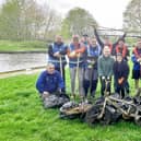 Volunteers from Novus Health with some of the haul from the first canal clean-up