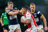 James McDonnell gets to grips with Hull KR's former Leeds star Ryan Hall. Picture by Allan McKenzie/SWpix.com.