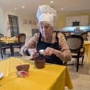 Resident enjoying cocktail and mocktail bar making workshop at HC-One’s Augustus Court Care Home during Care Home Open Week