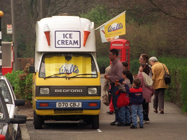 Visitors to Roundhay Park queue to buy an ice cream in April 1997.